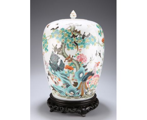 A LARGE CHINESE FAMILLE ROSE PORCELAIN JAR AND COVER, probably 19th Century, shouldered ovoid form, enamel painted with numer