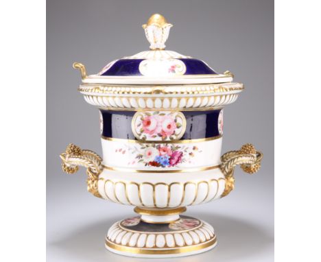 A CHAMBERLAINS WORCESTER ICE PAIL, CIRCA 1820, with liner and cover, of campana form with fruiting vine loop handles and mask