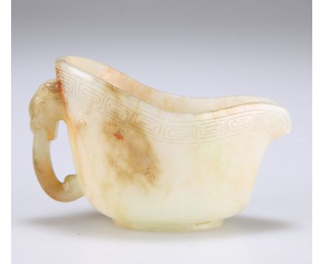 A SMALL CHINESE JADE LOW EWER, with incised Greek Key band and zoomorphic handle. 7cm longThe absence of a Condition Report d