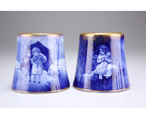 A PAIR OF&nbsp;ROYAL DOULTON BLUE CHILDREN SERIES VASES, of short flared form, one depicting two girls under an umbrella, the
