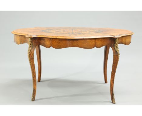 A 19TH CENTURY WALNUT AND FLORAL MARQUETRY CENTRE TABLE, the quarter veneered shaped oval top centred by an oval panel of flo