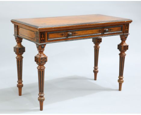 A GOOD VICTORIAN EBONISED AND MAHOGANY FOLD OVER CARD TABLE, the swivelling rectangular top opening to reveal a gilt tooled l