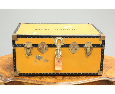 A VINTAGE TWO-HANDLED TRAVELLING TRUNK, with stencilled name to top. 36cm high, 74.5cm wide, 51.5cm deep