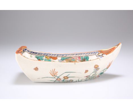 A JAPANESE SATSUMA POTTERY MODEL OF A BOAT, the interior painted with reserves of chrysanthemum and peonies amongst red and g