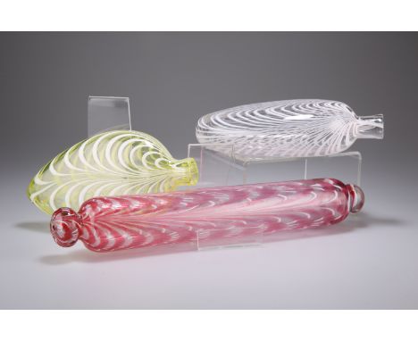 A NAILSEA PINK GLASS ROLLING PIN, 36.5cm long; together with TWO NAILSEA FLASKS. (3)The absence of a Condition Report does no