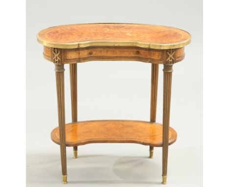 A SMALL FRENCH BURR WOOD AND CROSSBANDED RENIFORM SIDE TABLE, the brass mounted top above a frieze drawer, raised on fluted t