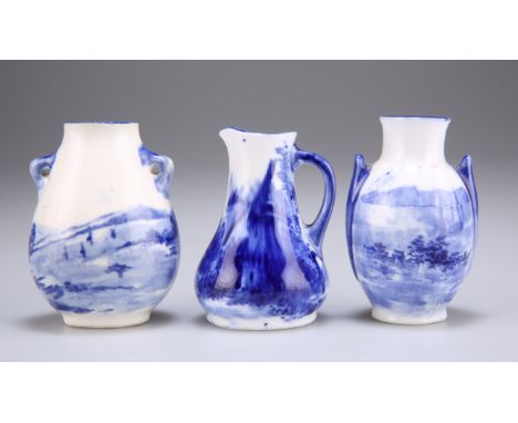 THREE PIECES OF ROYAL DOULTON MINIATURE BLUE AND WHITE CHINA, comprising; a baluster form two handled vase, depicting a windm