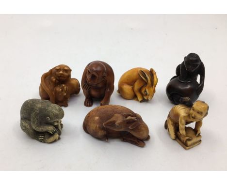 A collection of seven netsukes to include Meiji period netsuke