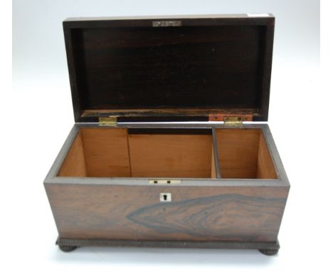 An early Victorian rosewood tea caddy, of sarcophagus form, w.33cm