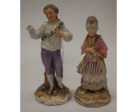 A circa 1900 Dresden porcelain figure of a nobleman wearing a floral sash (with losses) height 23cm, together with one other 