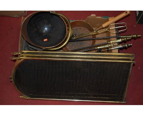 A box of miscellaneous metalware, to include copper helmet shaped coal scuttle, wrought iron fire tools, brass framed sparkgu