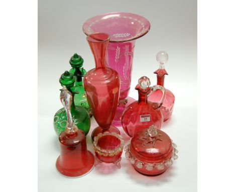 A collection of Victorian and later glassware, to include a large cranberry glass trumpet shaped vase with etched floral deco