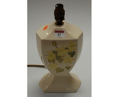 A modern Moorcroft pottery table lamp, on a cream ground with typical floral decoration, h.31cm (including fitting)