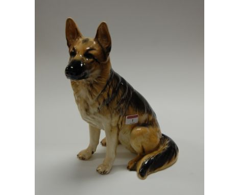 A large Beswick figure of a seated Alsatian, printed mark verso, model No.2410, h.35cm