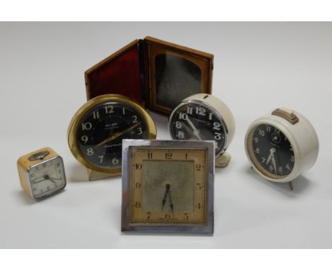 A box of miscellaneous items, to include a Victorian daguerreotype depicting family portrait, various modern frames, Big Ben 