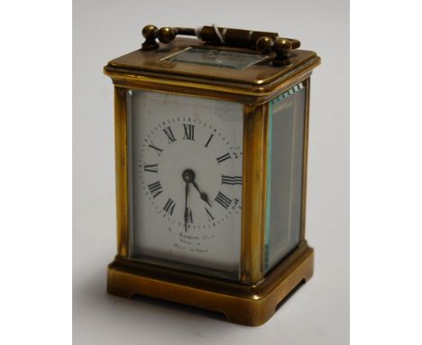 A lacquered brass minuet carriage clock, having visible platform escapement, single barrel going eight day movement, h.10cm