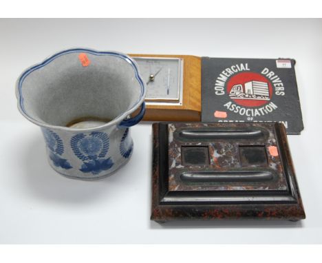 A 1950s walnut cased barometer, having a silvered dial; together with a reproduction Chinese crackle glazed blue and white ja