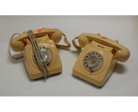 Two GPO cream bakelite telephones; together with a Supreme hairdryer, boxed