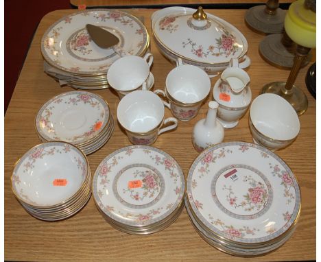 A Royal Doulton 6 place setting part tea and dinner service in the Canton pattern H5052