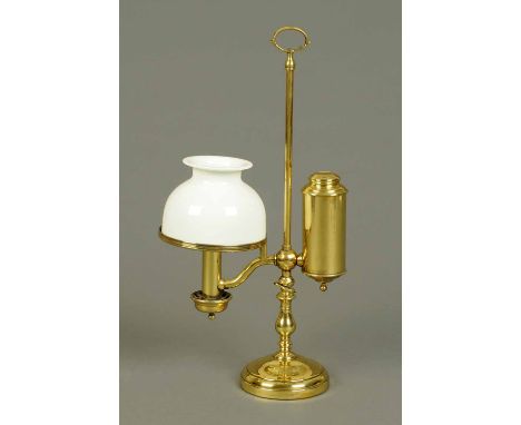 A Victorian brass student's lamp, with milk glass shade.  Height 22 ins (see illustration).  CONDITION REPORT: The lamp is in