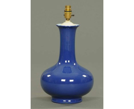 A blue glazed ware lamp base, with electrical fitting and drilled for flex.  Height excluding fitting 13 ins. CONDITION REPOR