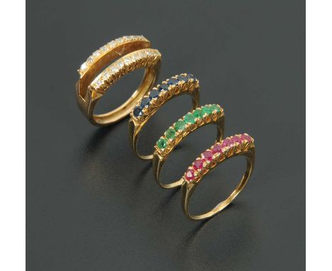 An Indian three-in-one ring, the main ring with two rows of diamonds, approximately .55 carats, with three separate centre ri