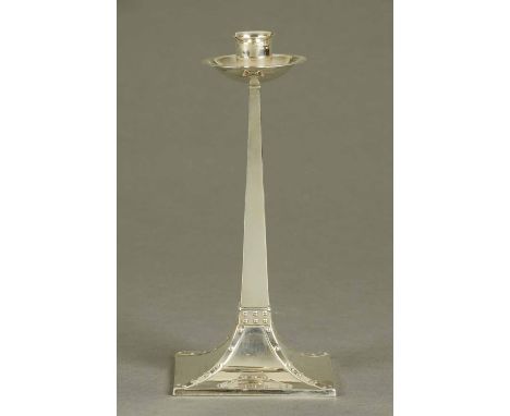 An Edwardian silver candlestick, James Dixon & Son, Sheffield 1906, weighted.  Height 22 cm. CONDITION REPORT: The marks to t
