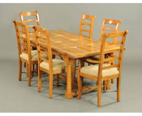 A Barker & Stonehouse Flagstone Range dining table and six chairs, the table with parquetry top, turned legs and centre stret