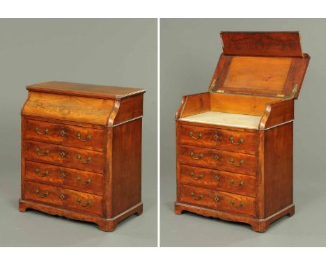 A Victorian mahogany chest of drawers, with piano front hinging to a marble surface and with four graduated drawers beneath w
