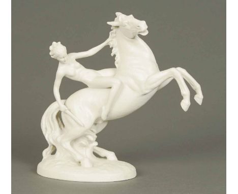 A German porcelain figure, female on horseback in the Art Deco style by K. Steiner.  Height 11.75 ins. 