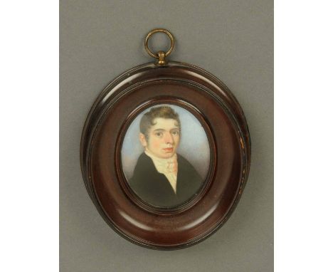 A Regency portrait miniature on ivory, Regency gentleman.  70 mm x 55 mm, framed. 