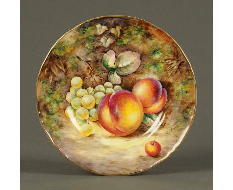 A Royal Worcester plate, Autumn Fruits, signed "C. Smith".  Diameter 8 ins. 
