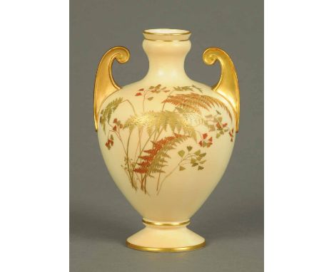 A Royal Worcester blush vase, twin handled, decorated with ferns, puce mark to base.  Height 9 ins.  CONDITION REPORT: The gi