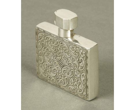 An early 20th century German perfume flask, engraved, circa 1910. CONDITION REPORT: The flask lid has a dent to one side. The