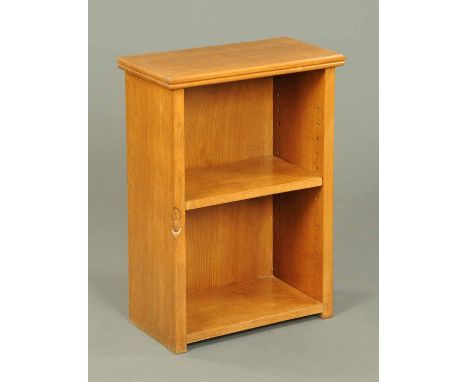 A Robert Mouseman Thompson oak small bookcase, with adzed top, moulded edge and with carved Mouse Trademark.  Width 19.25 ins