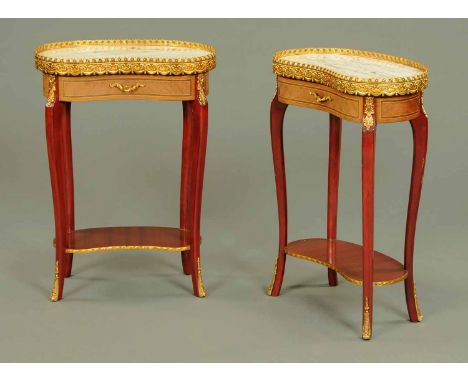 A pair of Louis XVI style kidney shaped side tables, with metal galleries, marble tops, frieze drawer and raised on cabriole 