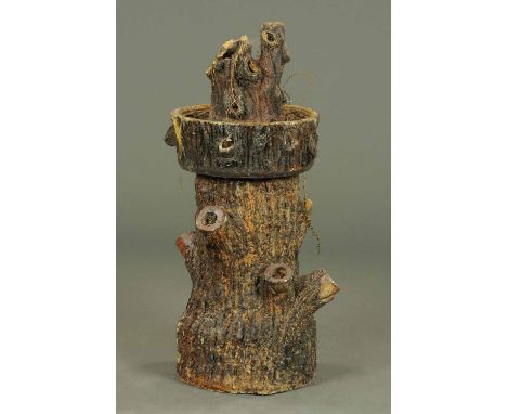A Victorian tree form planter, in two sections.  Diameter approximately 17 ins, height approximately 34 ins. 