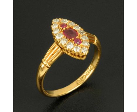 An 18 ct gold ruby and diamond set boat shaped ring, yellow gold, size M (see illustration).  CONDITION REPORT: Generally ver