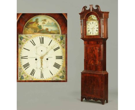 A large Victorian mahogany longcase clock by J.C. Elliott of Leeds, with swans neck pediment above the arched painted dial wi