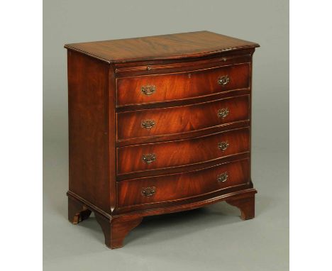 A mahogany serpentine fronted chest of drawers, with slide above four drawers and raised on bracket feet.  Width 29 ins.  