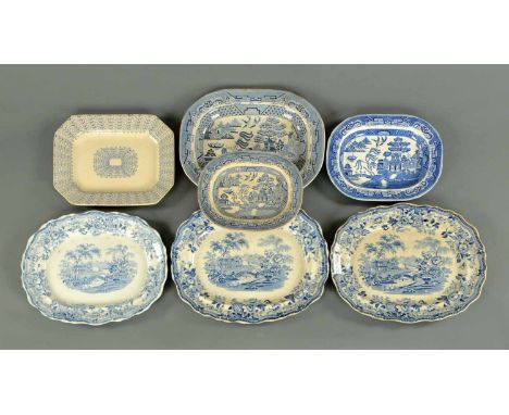 A collection of seven 19th century blue and white transfer printed meat plates.   Lengths from 12.5 ins to 19 ins. 