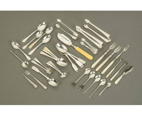 A collection of miscellaneous silver and silver plated flatware, including three pairs of silver sugar tongs, two silver butt
