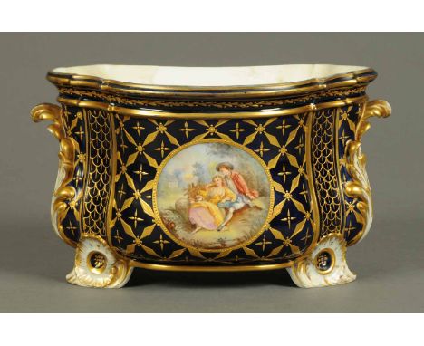 A 19th century French planter, handpainted with a courting couple, signed by the artist and with blue ground heightened with 