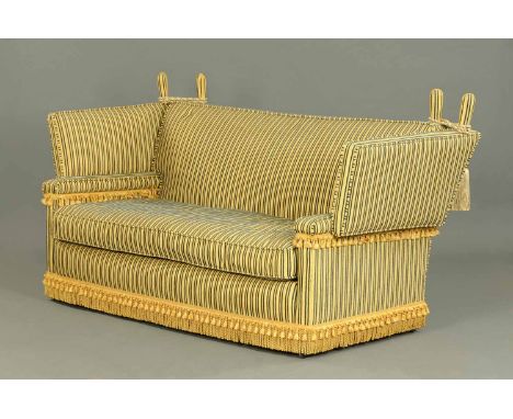 A large Knoll style settee, upholstered in striped velvet, width 77 ins, and a roll of matching material (see illustration). 