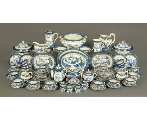 120 pieces of Booths Real Old Willow pattern dinnerware, including large tureen, three lidded tureens, eight dinner plates, t