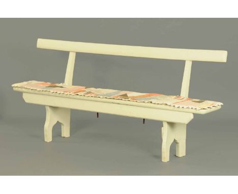 A Victorian painted wooden bench, with loose squab cushion.  Width 78 ins. 