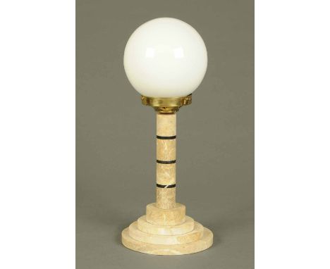 An Art Deco marble table lamp, with opaque glass shade, cylindrical column and stepped circular base.  Height 20 ins. 