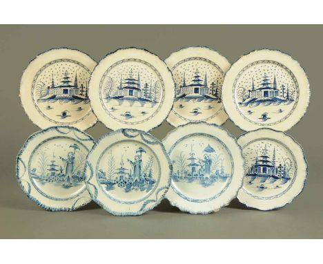 A collection of eight early 19th century blue and white plates, three decorated with an Oriental figure with umbrella in land
