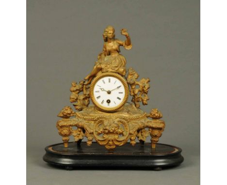 A French spelter figural mantle clock, with single-train movement.  Height 12 ins. 