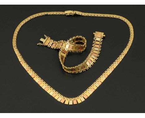 A matching necklace and bracelet, three colour 9 ct gold, 26.4 grams (see illustration).  CONDITION REPORT: Both pieces are s